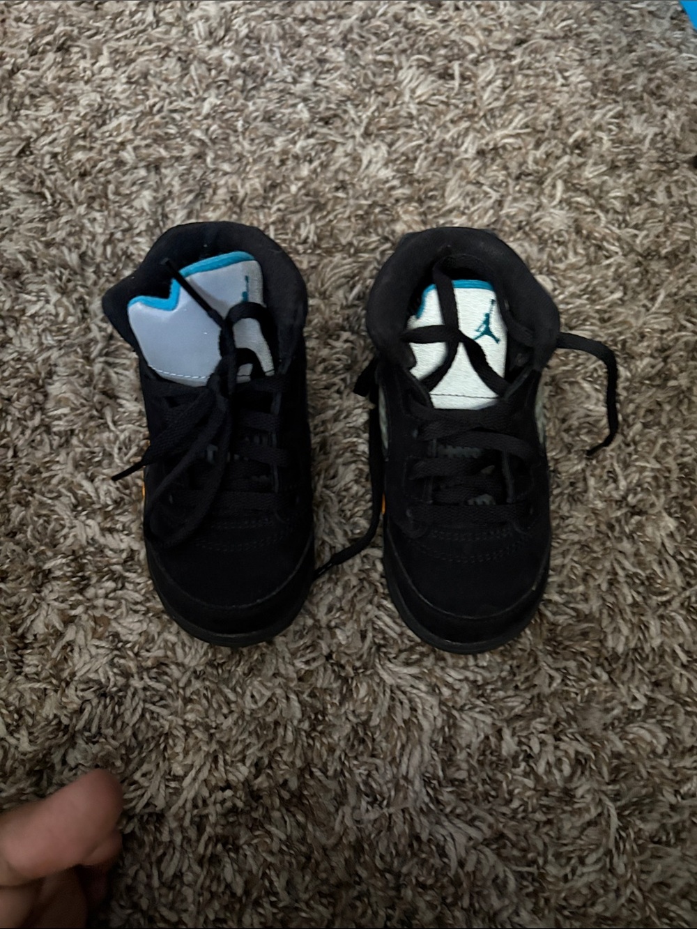 Jordan Kids Black Sneakers with Teal Tongue Accents